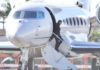 Musk is seen deplaning from his private jet in Los Angeles this past February. Diggzy/Jesal/Shutterstock